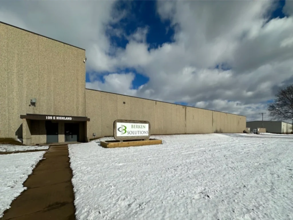 A street view of Berken Solutions' Manufacturing Facility with snow on the ground.