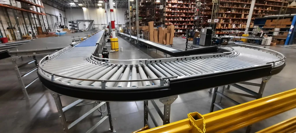 A conveyor system with a 90 degree curve that looks like a large letter U.